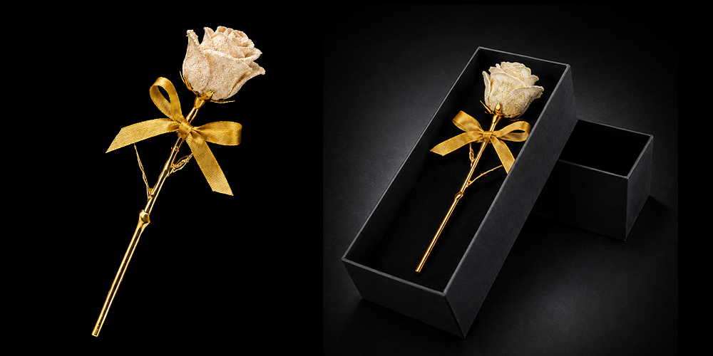 Rose belagt med diamantstøv og eske